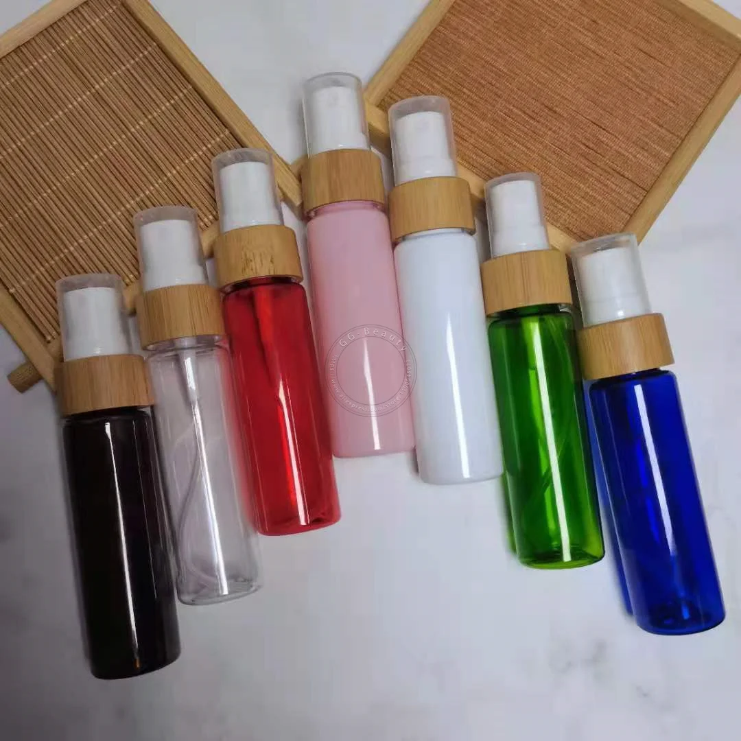 Toptan Doldurulabilir 30 ml Renkli Yuvarlak Plastik Şişeler Bambu Disk Üst Vidalı Kapaklı Parfüm Sprey Atomizer Boş Tüpler 1 OZ Görüntü 0