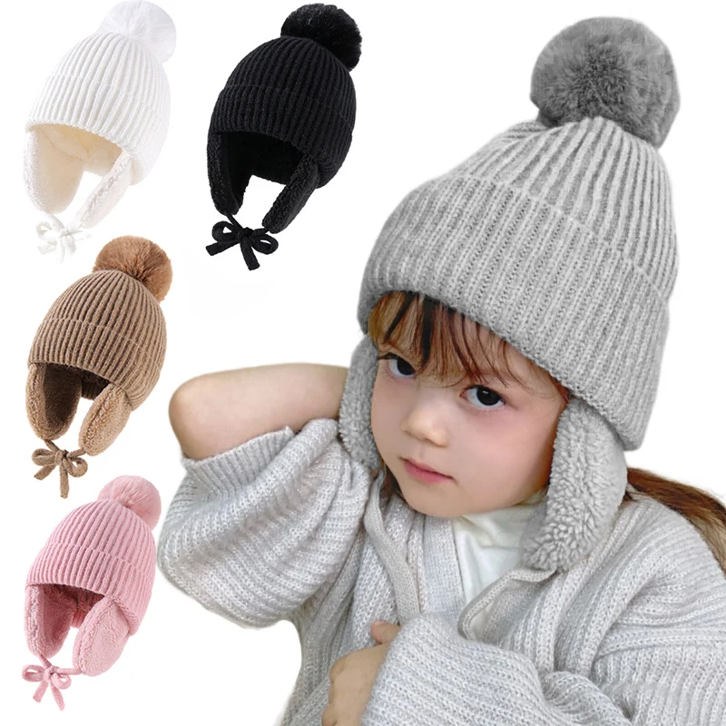 Yeni Kış Örme Şapka Earflaps İle Kalın Sıcak Peluş Bebek Şapka Büyük ponponlu bere Rüzgar Geçirmez Yün Çocuk örgü bere Kız Erkek Görüntü 0
