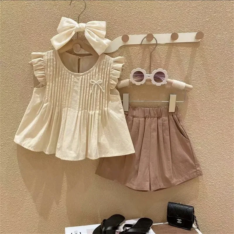 İlkbahar Yaz Kız Giyim Seti Yeni Sevimli Küçük Uçan Kollu Pilili Bebek Gömlek+Cep Şort 2 Adet Moda Kız Çocuklar Kıyafet Görüntü 0