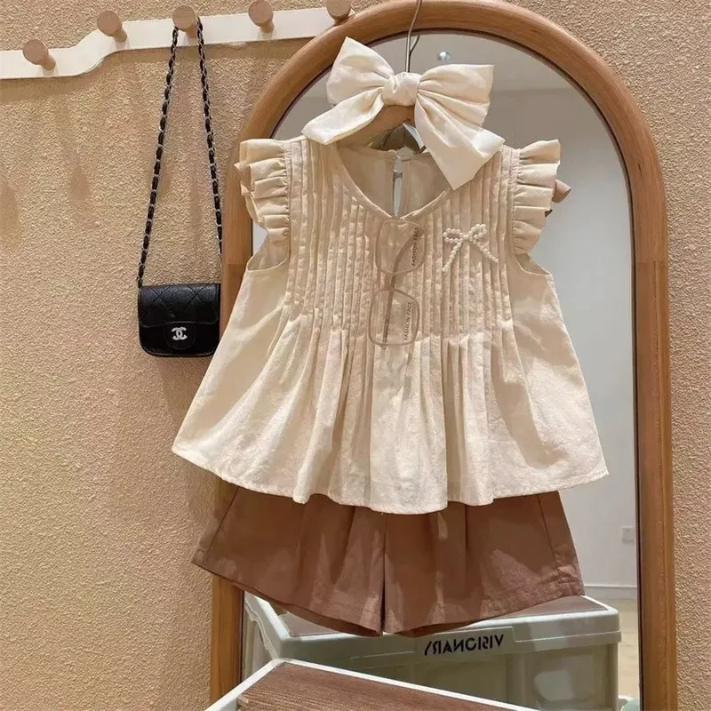 İlkbahar Yaz Kız Giyim Seti Yeni Sevimli Küçük Uçan Kollu Pilili Bebek Gömlek+Cep Şort 2 Adet Moda Kız Çocuklar Kıyafet Görüntü 1