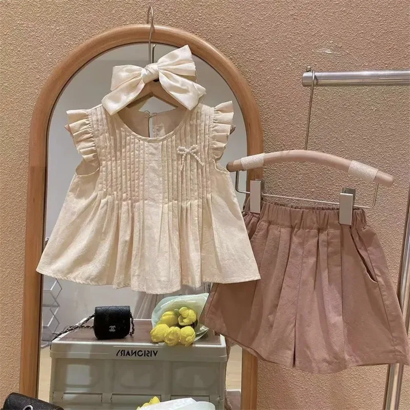 İlkbahar Yaz Kız Giyim Seti Yeni Sevimli Küçük Uçan Kollu Pilili Bebek Gömlek+Cep Şort 2 Adet Moda Kız Çocuklar Kıyafet Görüntü 2